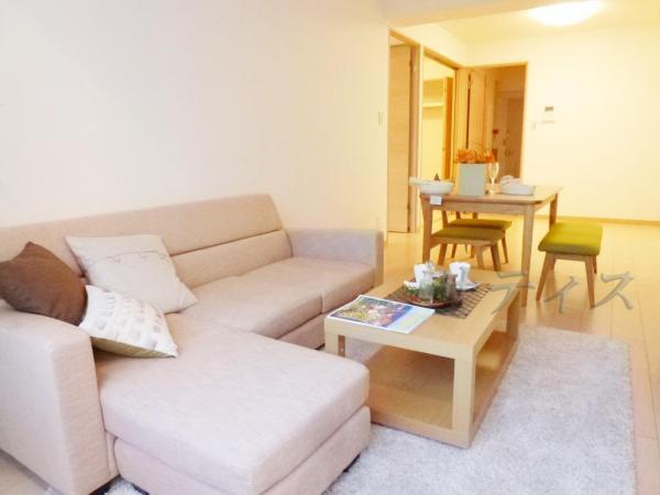 Living. ~ It is placed a large sofa with the comfort living space ~