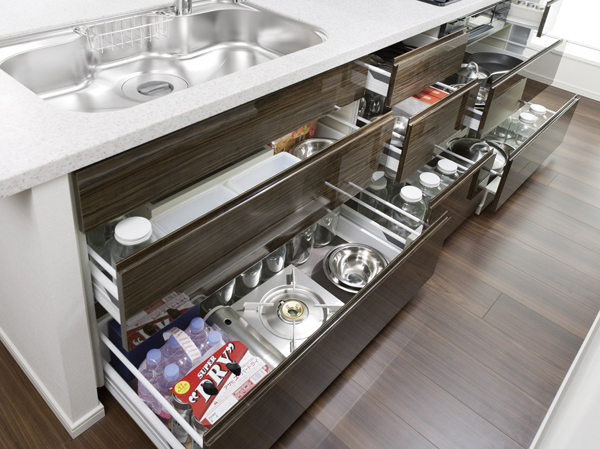 Kitchen.  [Plenty can be stored "slide storage"] Storage of system kitchens, It can be effectively utilized in the prone cabinet in a dead space, It has adopted a sliding storage. (60A 'type same specifications ※ August 2011 shooting)