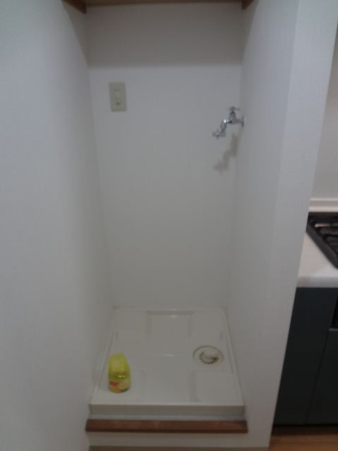 Other Equipment. Washing machine in the room