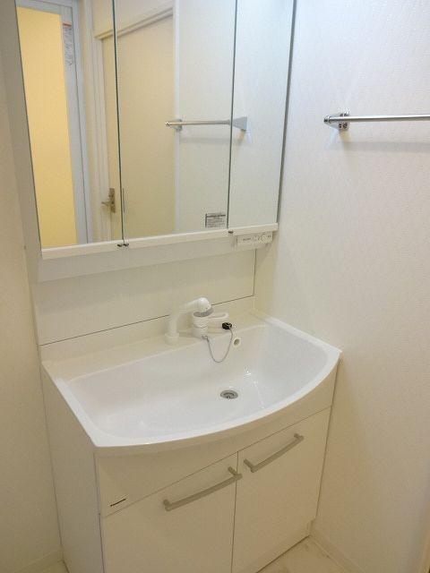 Wash basin, toilet. Bathroom vanity