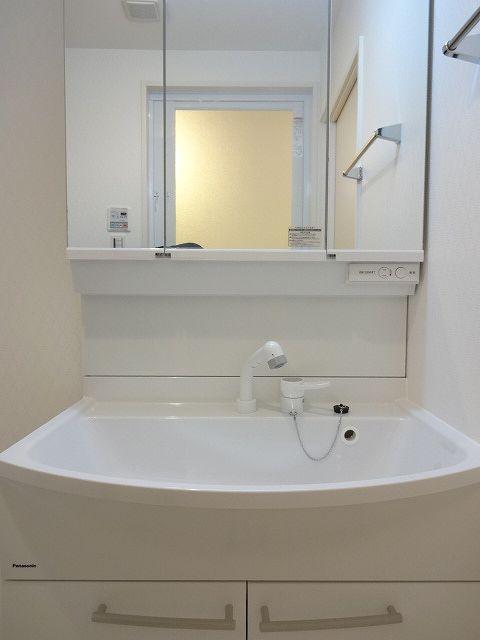 Wash basin, toilet. Bathroom vanity