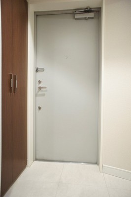 Entrance. There shoe box on the right hand side