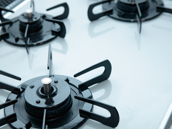 Kitchen.  [Hyper-glass coat the top plate] The top plate adopts material was adhered to glassy tough metal. Strongly to heat and shock, It is easy to clean.