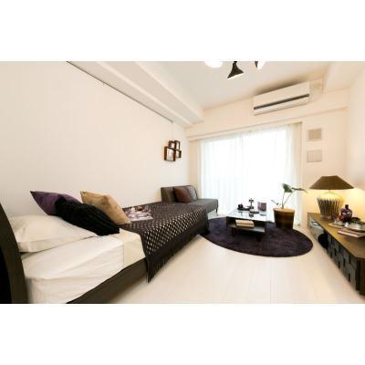 Living and room. The window is large, bright room.