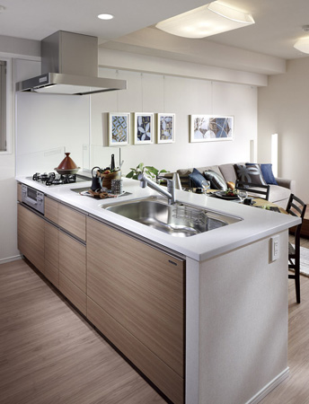 Kitchen.  [Open-minded Peninsula kitchen in full open] It arranged kitchen like a peninsula (Peninsula) from the wall. Since the upper part is missing to-ceiling, living ・ It will produce the dining and airy space that became an integral. (Except for some dwelling unit)