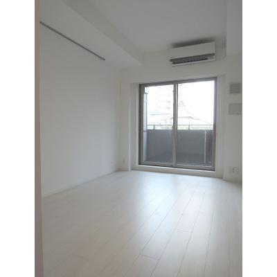 Living and room. The window is large, bright room.