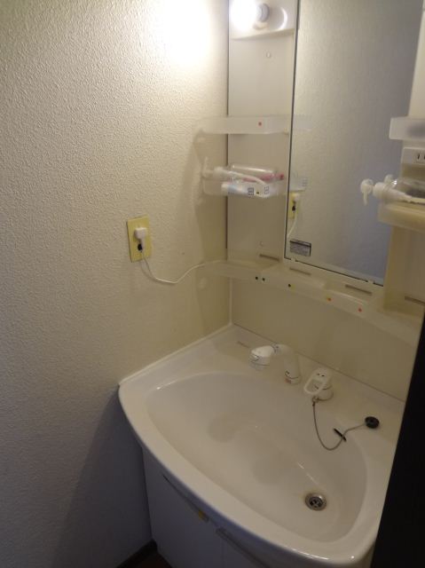 Washroom. Basin shared.