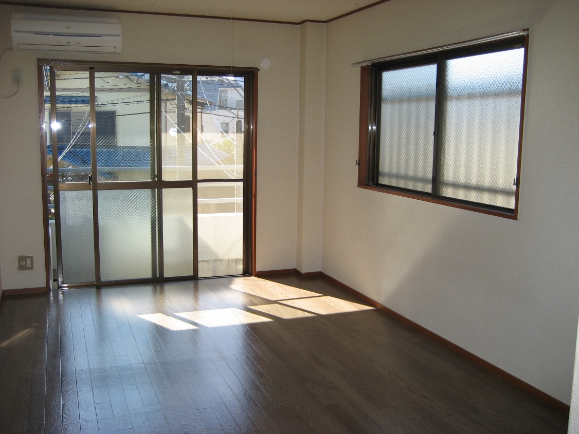 Living and room. Good day in the southwest two-sided window!