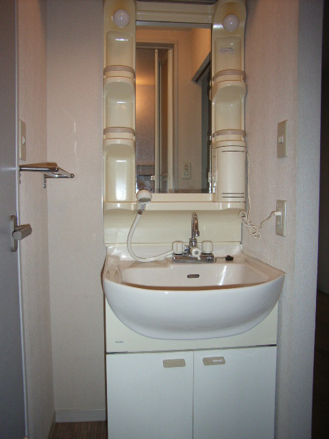 Washroom. There is a separate wash basin.