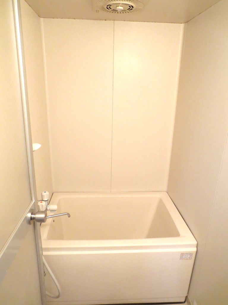 Bath. It is a bathroom with cleanliness