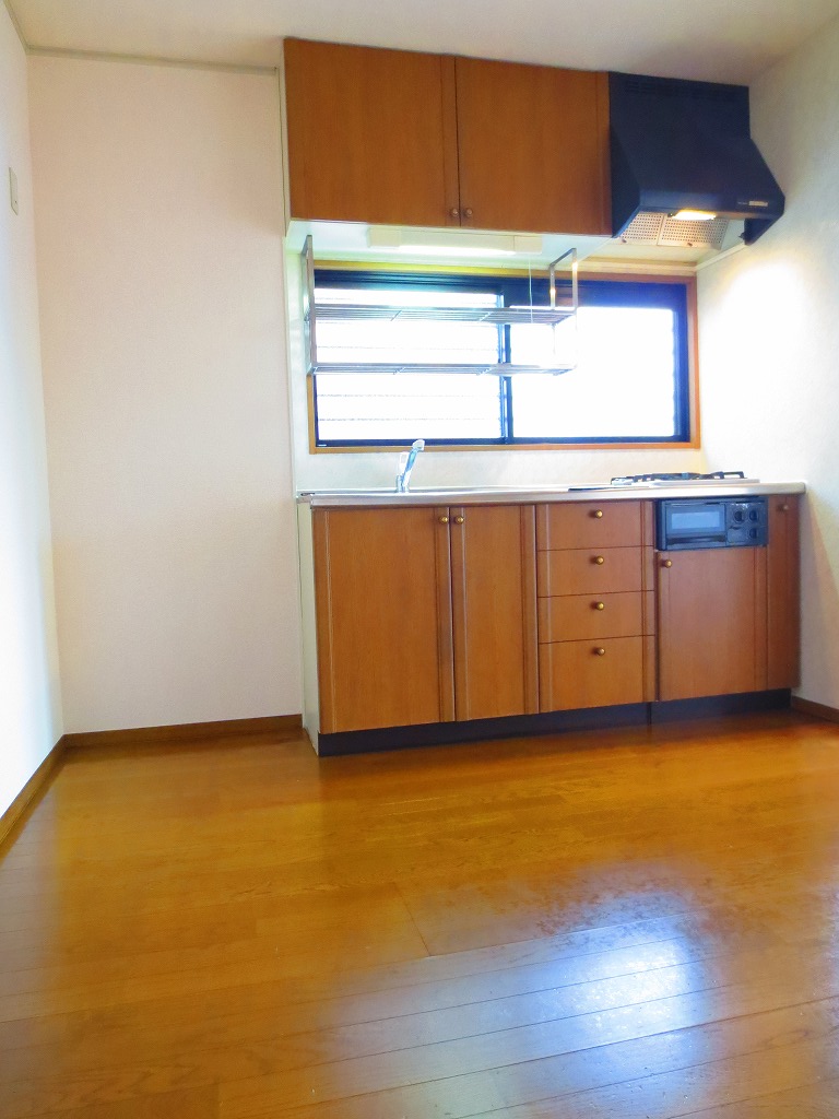 Kitchen. It is around the bright kitchen there is a window