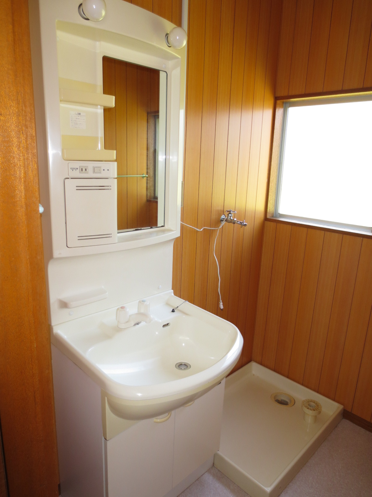 Washroom. Waterproof bread with Washing machine in the room