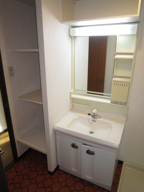 Washroom. Waterproof bread with Washing machine in the room