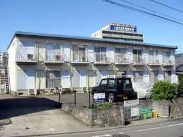 Building appearance. Day is good for the front parking lot