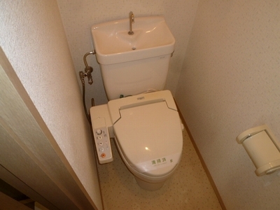 Toilet. Washlet is with