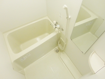 Bath. There is a large mirror, It is relaxing bath