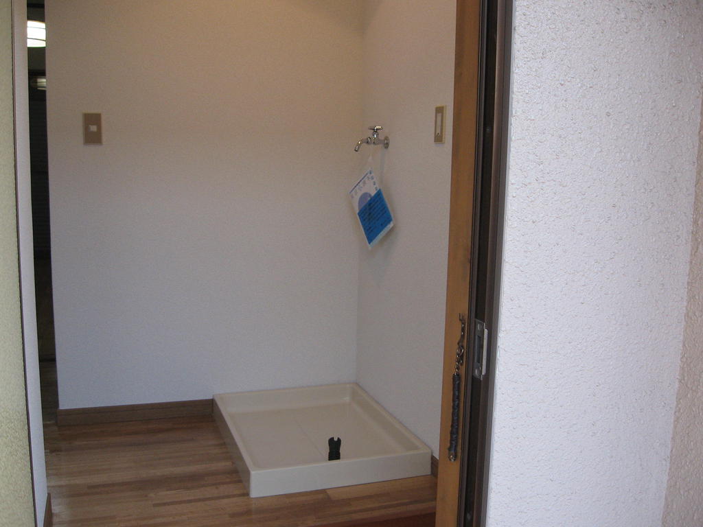 Other Equipment. Washing machine in the room