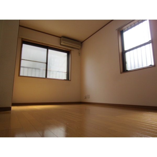 Living and room. Because of the corner room two-sided lighting, Day is good.