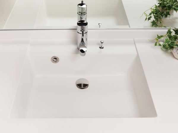 Bathing-wash room.  [Counter-integrated Square wash bowl] Artificial marble of wide type of counter and the bowl is a beautiful design that is integrated.