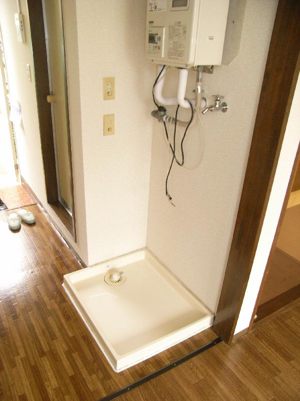 Other Equipment. Washing machine in the room