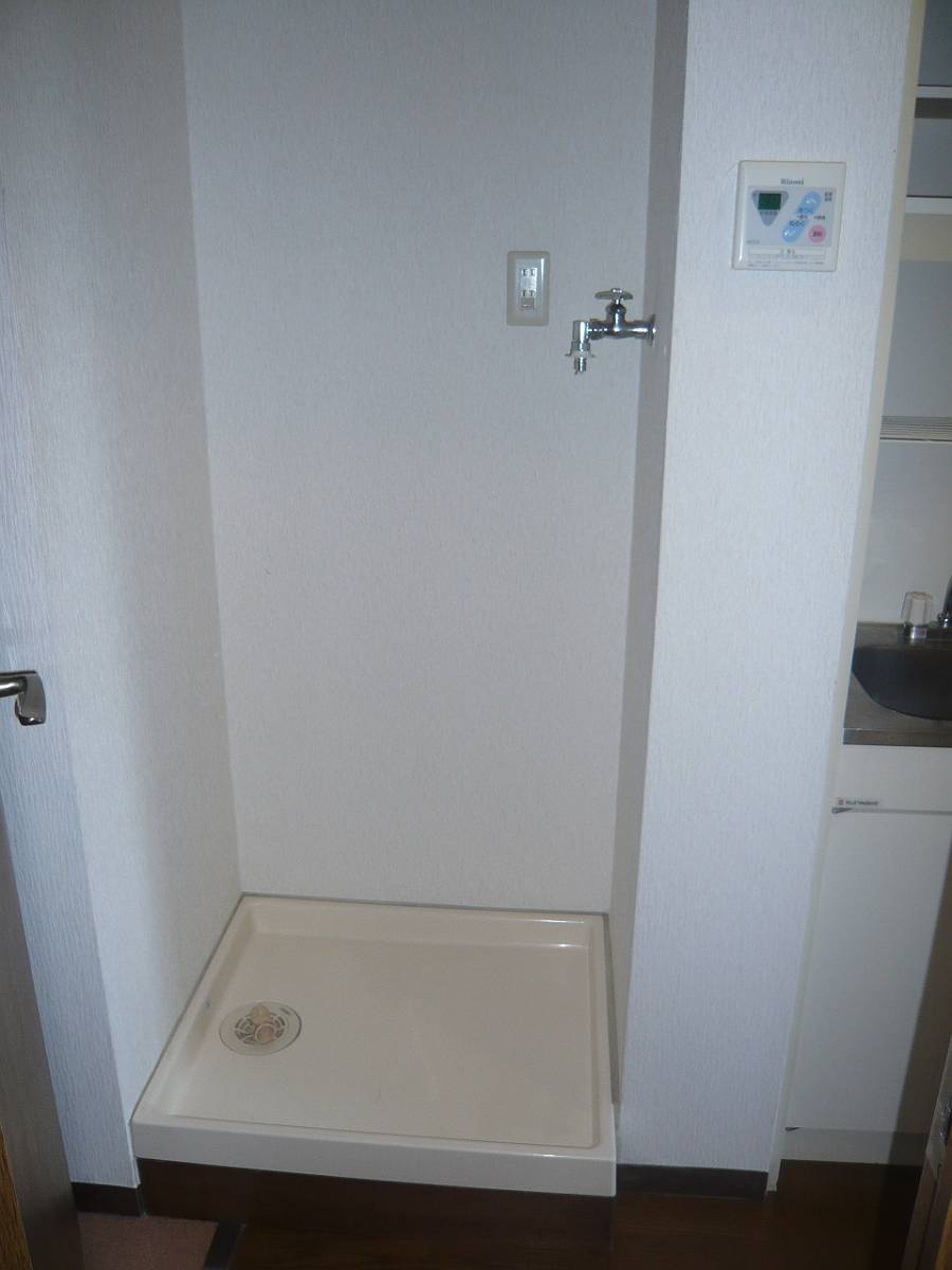 Other Equipment. Washing machine in the room