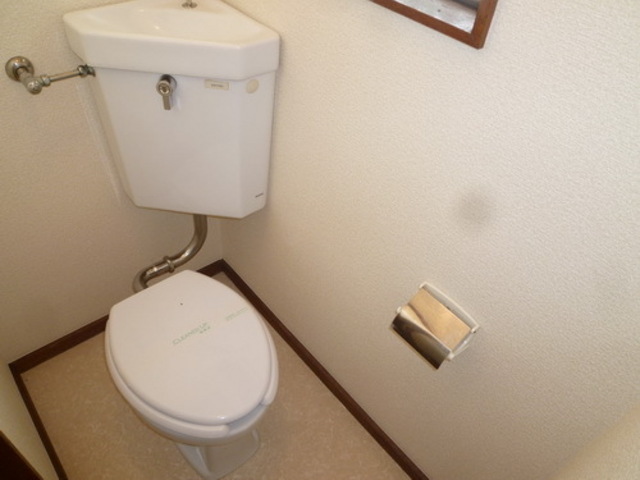 Toilet. There is a window in the toilet