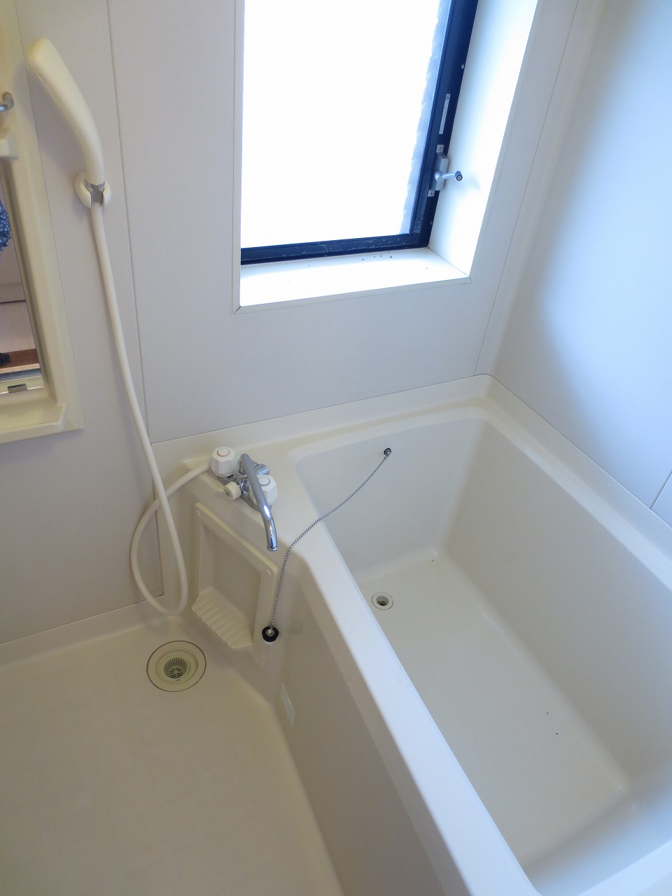 Bath. It is bright and there is a window