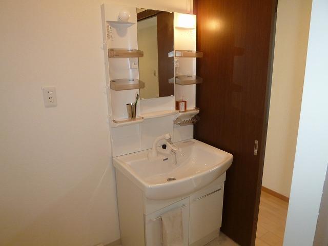 Wash basin, toilet. Bathroom vanity