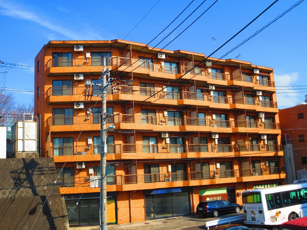 Building appearance. Worry of the day near the rain bus stop