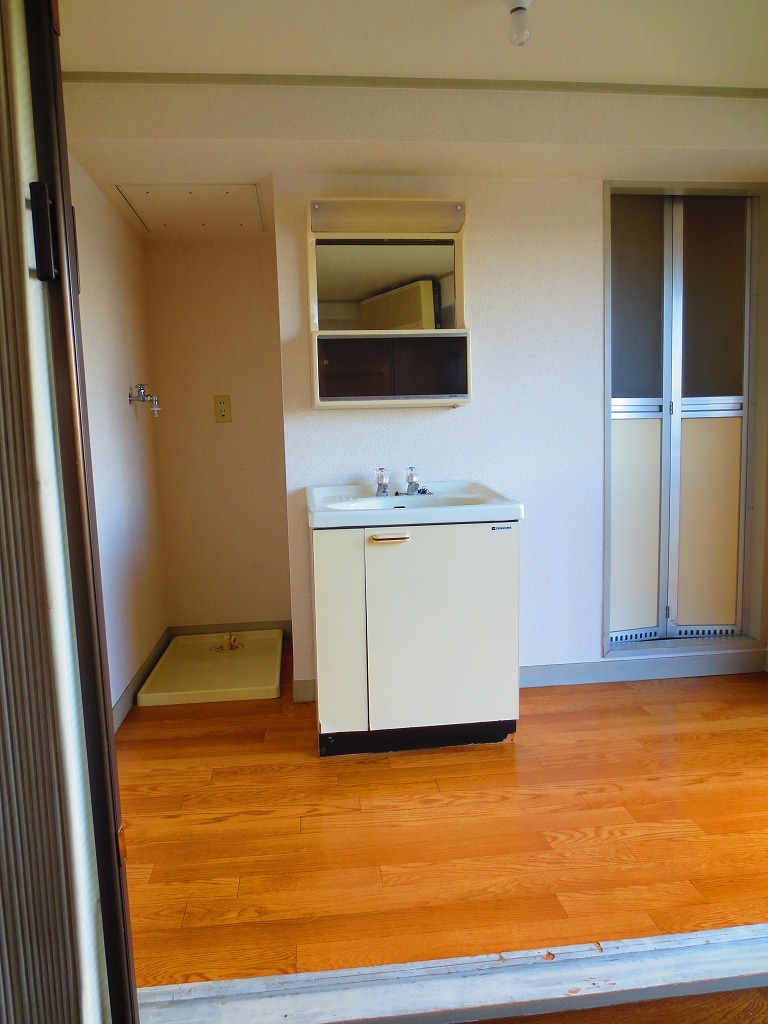 Washroom. There is also waterproof bread with Washing machine in the room