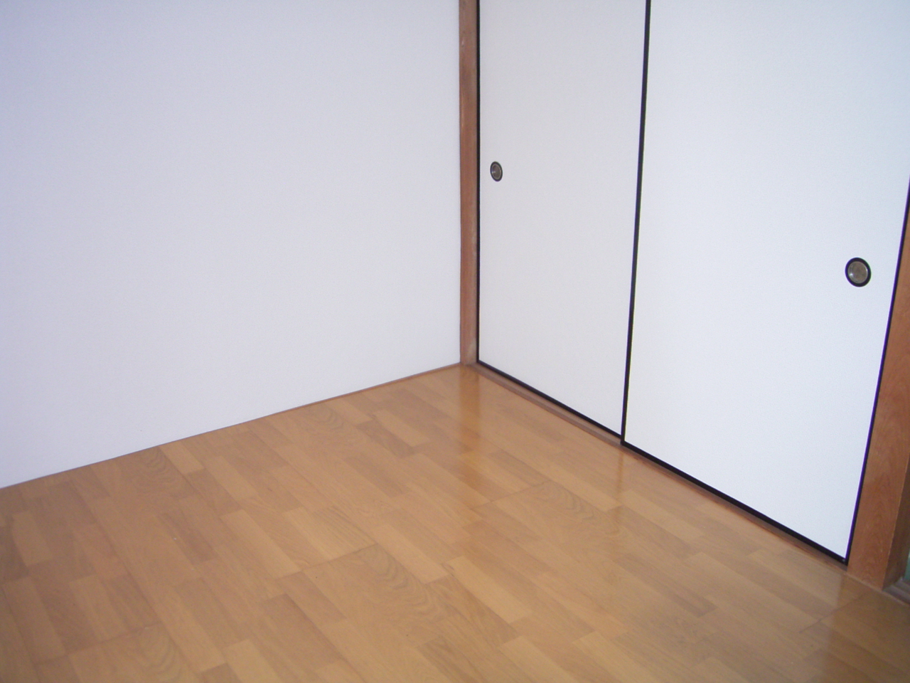 Living and room. Beautiful flooring there is a shiny