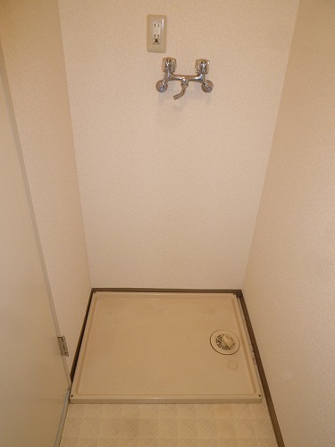 Other Equipment. Washing machine in the room