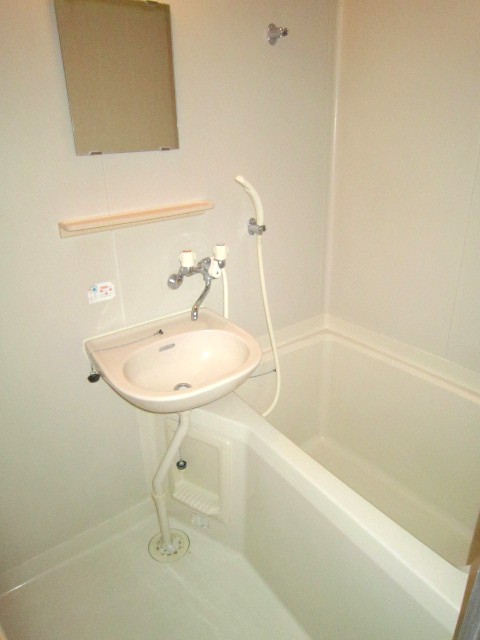 Bath. It is a bathroom with cleanliness