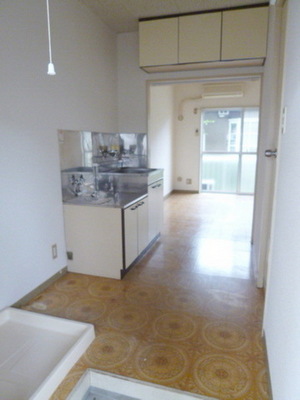 Entrance. There is housed in the kitchen top