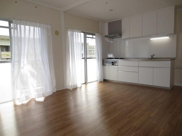 Living. Bright sunshine is plugged into a living-dining