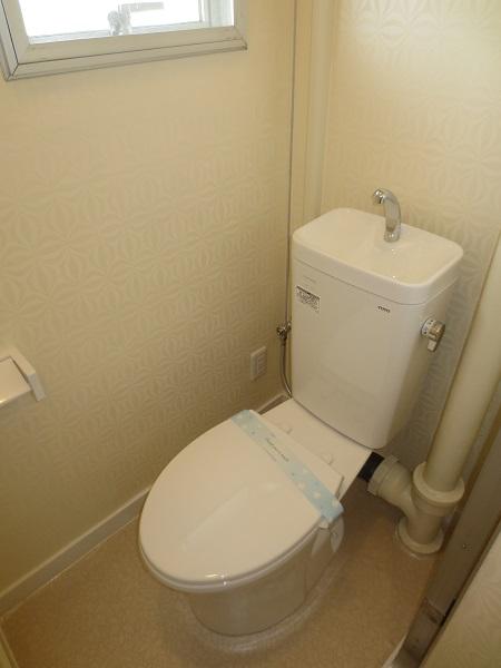 Toilet. It is a toilet with a window