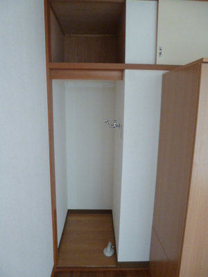 Other Equipment. Washing machine in the room