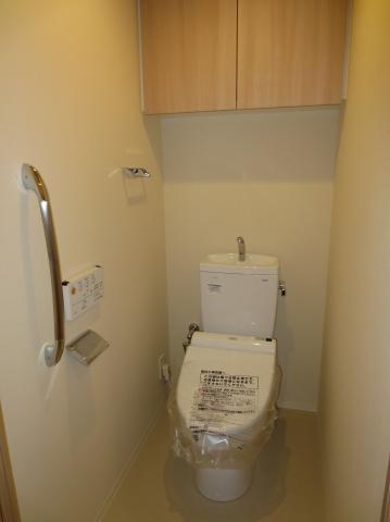 Toilet. Toilet, It is with a cleaning function. Also it comes with a hanging cupboard.