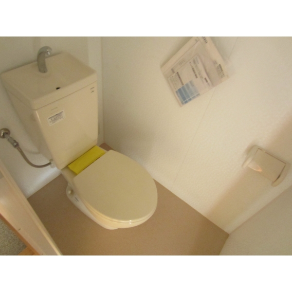 Toilet. It is an independent type of kitchen.