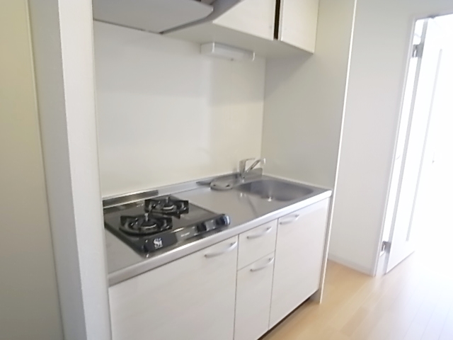 Living and room. Gas two-burner stove is a system Kitchen.