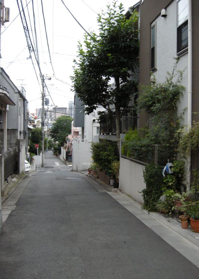 Local photos, including front road. It is located in a quiet residential area.