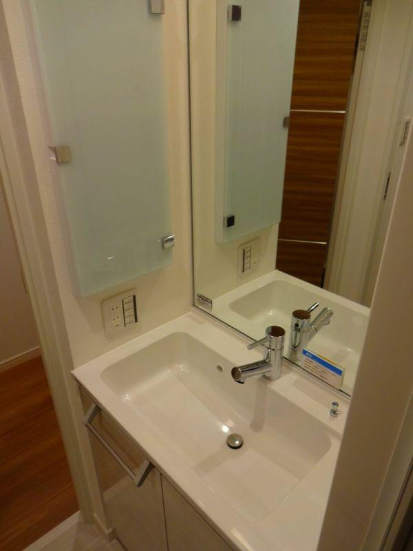 Wash basin, toilet. Bathroom vanity