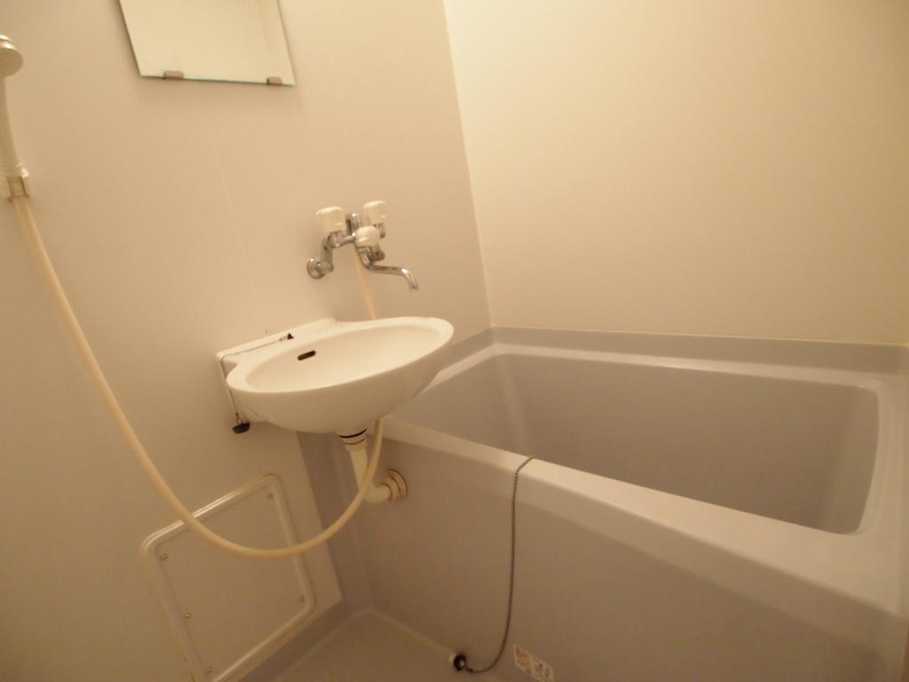 Bath. Same property, It is a photograph of another room