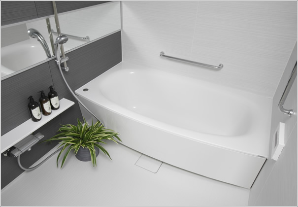 Bathing-wash room.  [unit bus] Relax and enjoy bath time, 1620 size ( ※ ). Design of arcuate tub to draw a soft arch. There is no place where a sharp object on the inside, Since the apron also with a gentle angle diagonally, You can bathe in the sense of being wrapped gently. The height of the tub, So that it can be comfortably out, About 450mm and lower in design. Also, Of course, the floor is hard to slip it, Easy to dry, It was considered so easy to be cleaned.  ※ 60A-NW, 60B-SE, 70A-SW, 80A-NE, 80B-SW, 80C-SW, 80D-NW, 80E-NW, 80F-NW, each dwelling unit of 80G-NE is 1418 size.