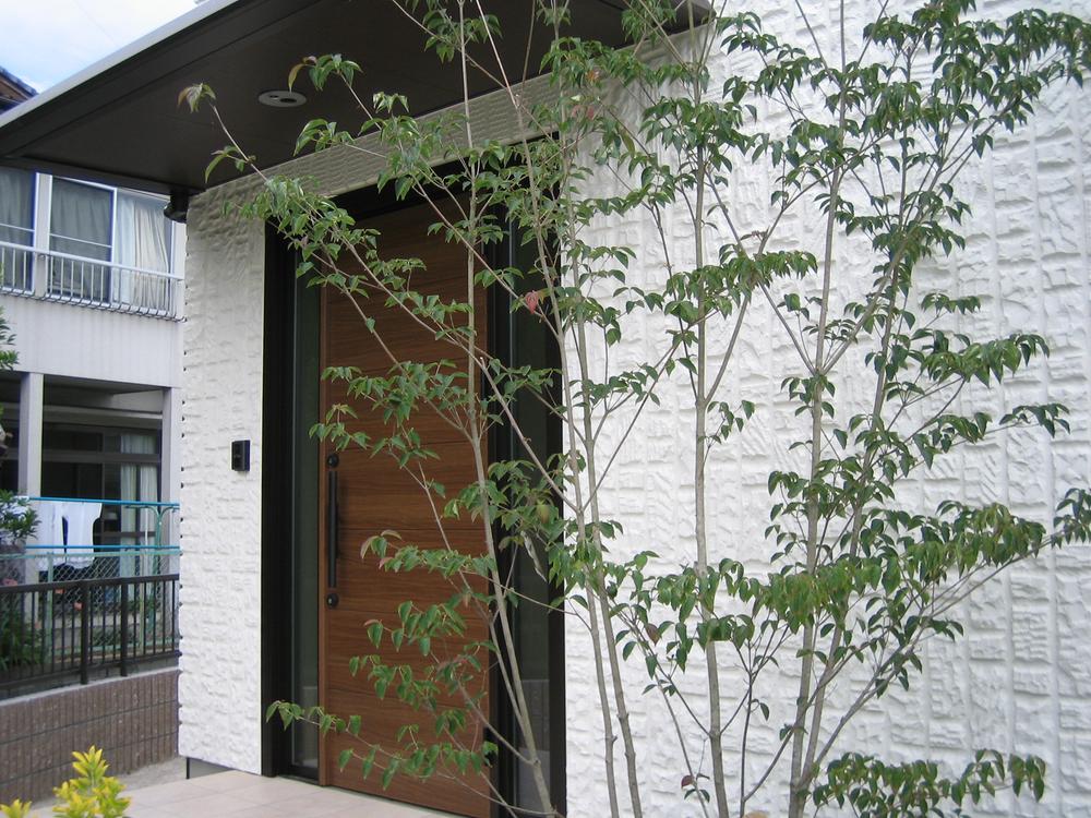 Entrance. It will be the entrance friendly by planting a symbol tree