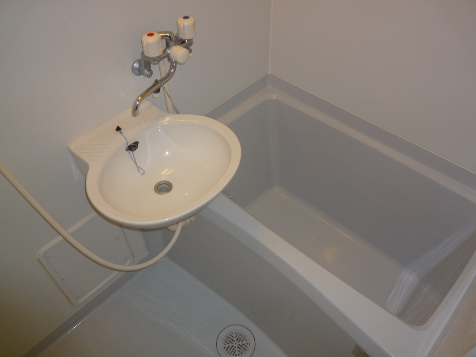 Bath. Bathroom was a white tones