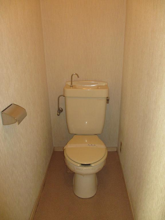 Toilet. Separate from the bus