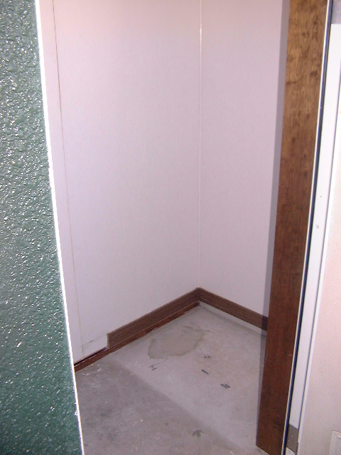 Receipt. Entrance next to the outside storeroom