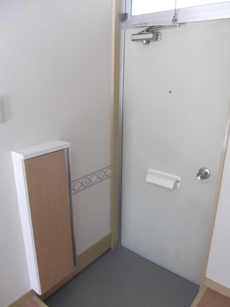 Entrance. With shoe box