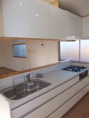 Kitchen. New unused 3-burner stove with kitchen